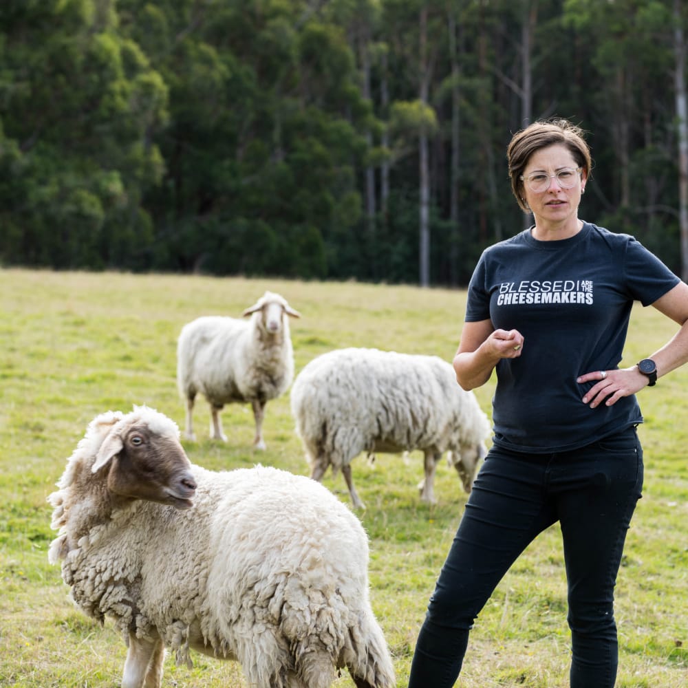 Sheep milk skincare effectiveness – Nicole with sheep at Grandvewe